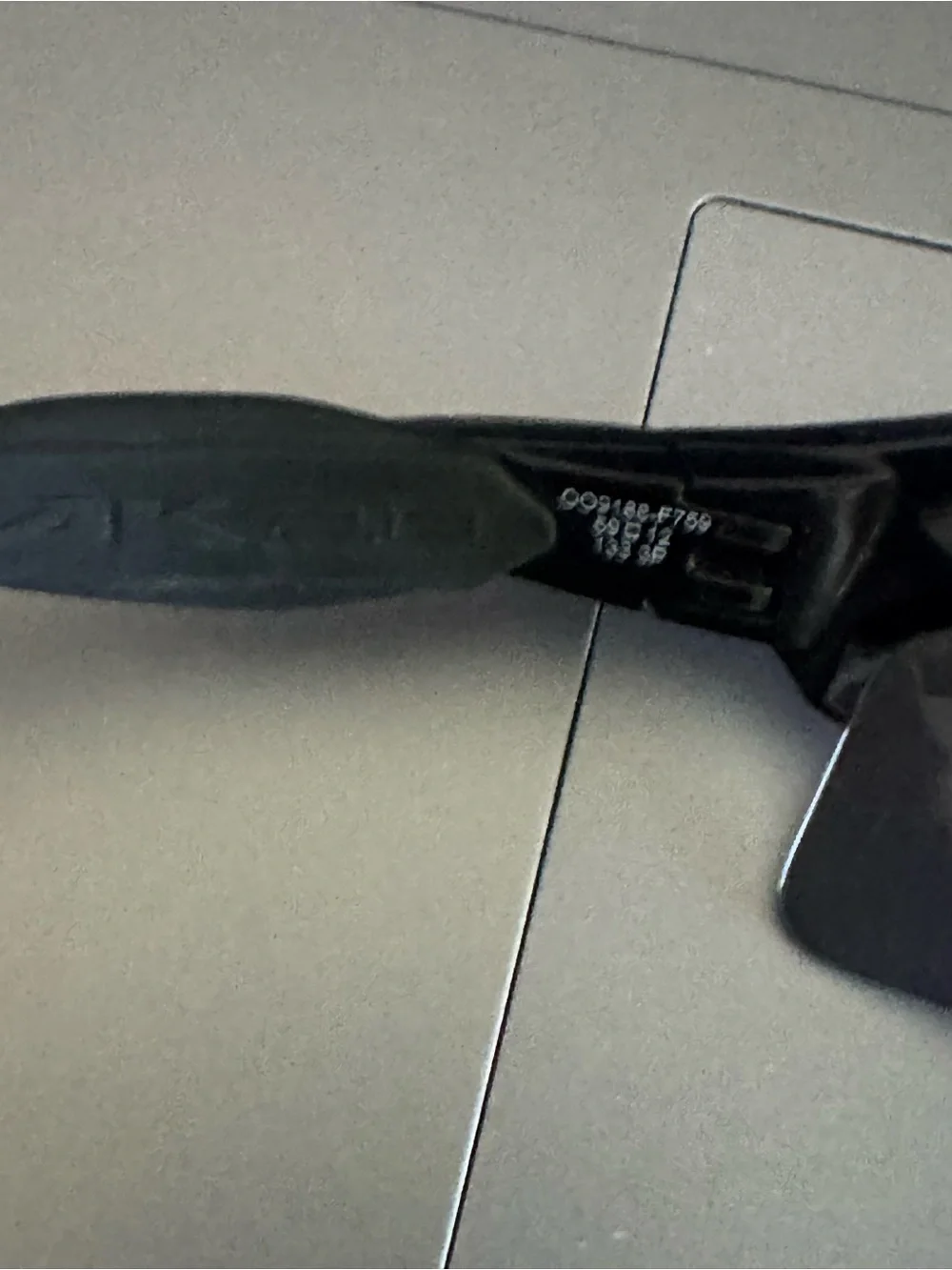 Oakley Men's Matte Black Frame Sunglasses with Blue Mirrored Lense